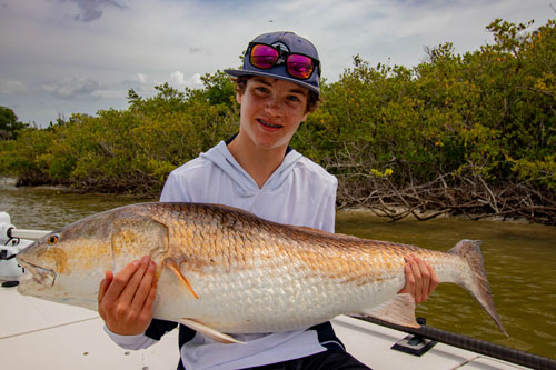 trophy redfish charter fishing near orlando